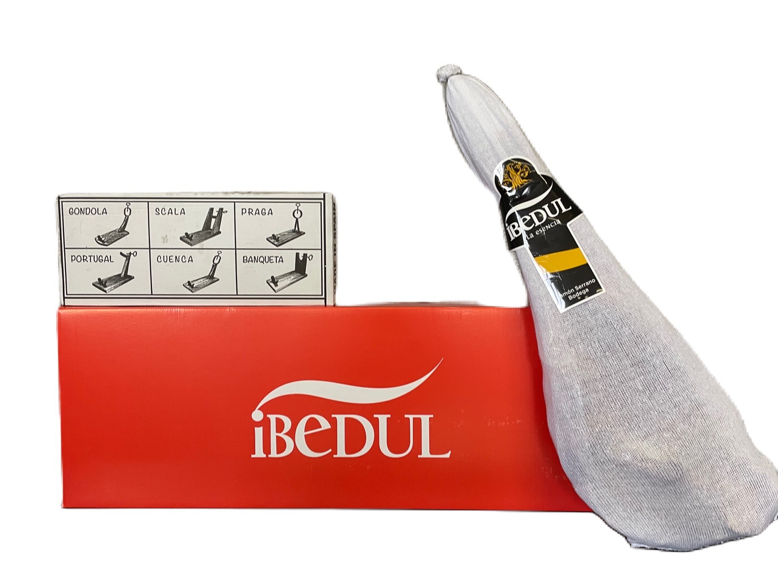 Хамон в подарунковій упаковці Ibedul Jamon Serrano з підставкою та ножем 6кг Хамон в подарунковій упаковці Ibedul Jamon Serrano з підставкою та ножем 6кг