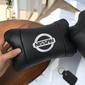 Подушки в авто 2 шт Nissan, натуральна шкіра, з логотипом Ніссан, на підголівник для вашої машини. Зображення №16