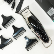 Бездротова акумуляторна машинка для стрижки триммер VGR V-093 з насадками. Зображення №12