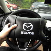 Набор кожаных подушек Mazda с вышивкой логотипа + подарок – кожаный брелок. Изображение №13 Набор кожаных подушек Mazda с вышивкой логотипа + подарок – кожаный брелок. Изображение №13