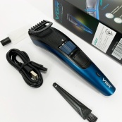 Универсальная аккумуляторная машинка VGR V-053B для стрижки волос, бороды, усов и тела, зарядка от USB. Изображение №2