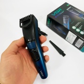 Универсальная аккумуляторная машинка VGR V-053B для стрижки волос, бороды, усов и тела, зарядка от USB. Изображение №9