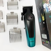 Аккумуляторная машинка для стрижки VGR V-196 GREEN. Изображение №17