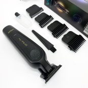 Акумуляторна машинка для стрижки VGR V-995 + 4 насадки, 2000 мАг, USB. Зображення №2