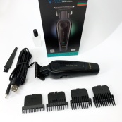Акумуляторна машинка для стрижки VGR V-995 + 4 насадки, 2000 мАг, USB. Зображення №4