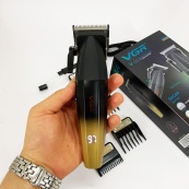 Машинка для стрижки волос аккумуляторная Professional Turbo с разными насадками VGR V-003. Цвет: желтый. Изображение №7 Машинка для стрижки волос аккумуляторная Professional Turbo с разными насадками VGR V-003. Цвет: желтый. Изображение №7