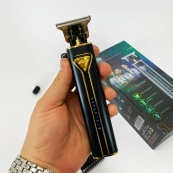 Професійна акумуляторна машинка для стрижки VGR V-009 тример для бороди та вусів. Колір: золотий. Зображення №13