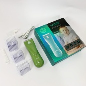 Дуже тиха бездротова машинка для стрижки волосся дітей VGR V-150 з насадками. Колір: зелений. Зображення №8