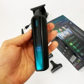 Профессиональный триммер для бороды и усов с керамикой VGR V-930 насадки 1-7 мм. Цвет: зеленый. Изображение №12