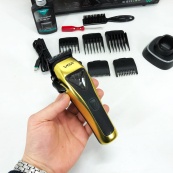 Машинка для стрижки VGR V-015 акумуляторна бездротова професійна 6 насадок. Зображення №25