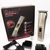 Машинка для стрижки Gemei GM-657 бездротова з комплектом насадок, Перукарські машинки. Зображення №10