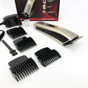 Машинка для стрижки Gemei GM-657 бездротова з комплектом насадок, Перукарські машинки. Зображення №17