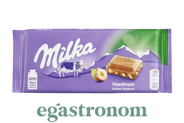Шоколад Мілка подрібнений лісовий горіх Milka broken haselnuss 80g 25шт/ящ Шоколад Мілка подрібнений лісовий горіх Milka broken haselnuss 80g 25шт/ящ