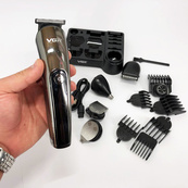 Бездротова машинка для стрижки волосся VGR V-107 тример для бороди та вусів зі змінними насадками. Зображення №9