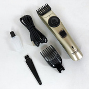 Машинка для стрижки волосся бездротова VGR V-031, тример для бороди вусів 2 насадки, окантувальна машинка. Зображення №12