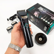 Профессиональная беспроводная машинка для стрижки VGR V-682 триммер для волос, бороды и усов на подставке. Изображение №19