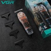 Профессиональный триммер для стрижки волос и бороды VGR V-953 с насадками, окантовочная машинка. Изображение №3