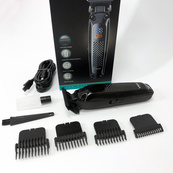 Машинка для стрижки волосся триммер VGR V-972 професійна з насадками акумуляторна USB. Зображення №2