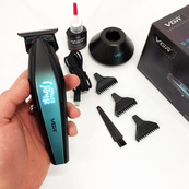 Машинка для стрижки волос с мощным мотором XPRO VGR V-992 GREEN с насадками 1-2-3 мм. Изображение №7