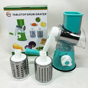 Овочерізка мультислайсер Tabletop Drum Grater Kitchen Master Терка для овочів та фруктів 3 насадки. Колір: блакитний. Зображення №2 Овочерізка мультислайсер Tabletop Drum Grater Kitchen Master Терка для овочів та фруктів 3 насадки. Колір: блакитний. Зображення №2