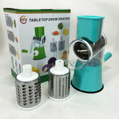 Овочерізка мультислайсер Tabletop Drum Grater Kitchen Master Терка для овочів та фруктів 3 насадки. Колір: блакитний. Зображення №14 Овочерізка мультислайсер Tabletop Drum Grater Kitchen Master Терка для овочів та фруктів 3 насадки. Колір: блакитний. Зображення №14