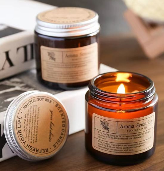 Ароматична соєва свічка Aroma Sensation у бурштиновій банці 50г з кришкою Ароматична соєва свічка Aroma Sensation у бурштиновій банці 50г з кришкою