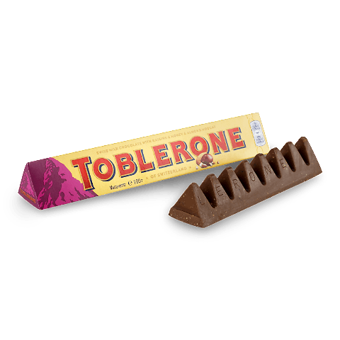 Шоколад молочний Toblerone Fruit & Nuts з родзинками, медом і мигдальною нугою 100г Шоколад молочний Toblerone Fruit & Nuts з родзинками, медом і мигдальною нугою 100г