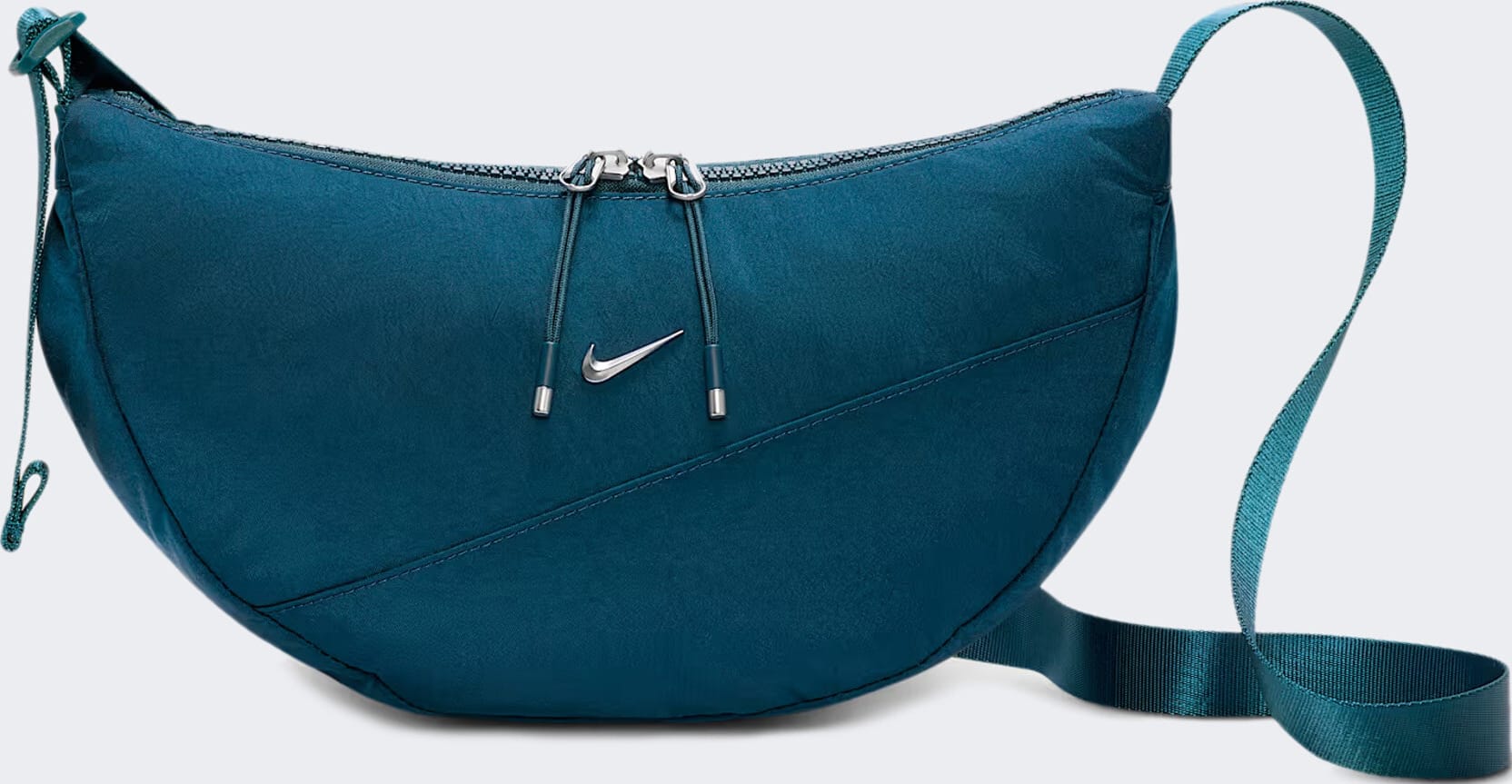 Сумка Nike NK AURA CRESCENT CROSSBODY 4L темно-синій Жін 30 х 18 х 10 см (HQ4370-415) Сумка Nike NK AURA CRESCENT CROSSBODY 4L темно-синій Жін 30 х 18 х 10 см (HQ4370-415)