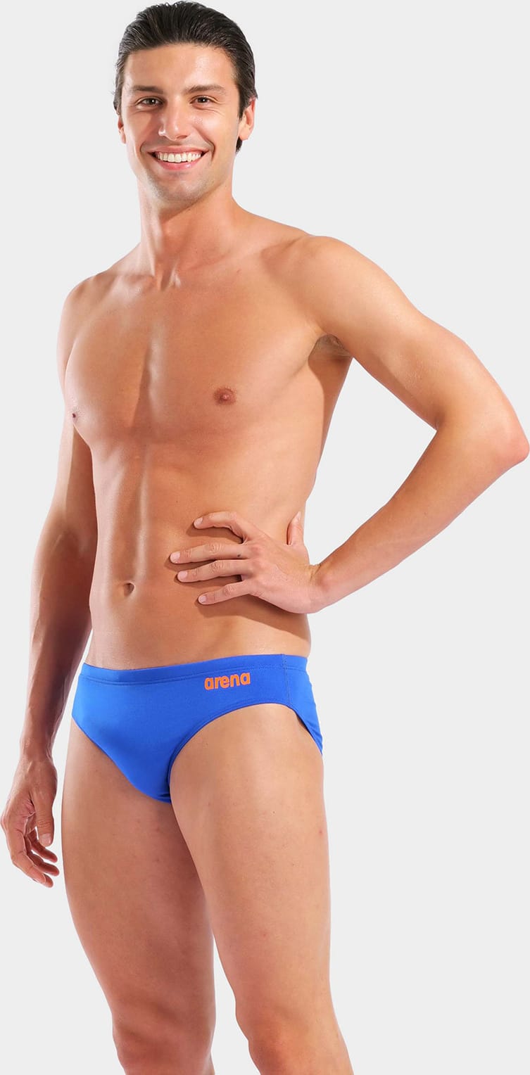 Плавки Arena TEAM SWIM BRIEFS SOLID синій, помаранчевий Чол 85 (004773-803) Плавки Arena TEAM SWIM BRIEFS SOLID синій, помаранчевий Чол 85 (004773-803)
