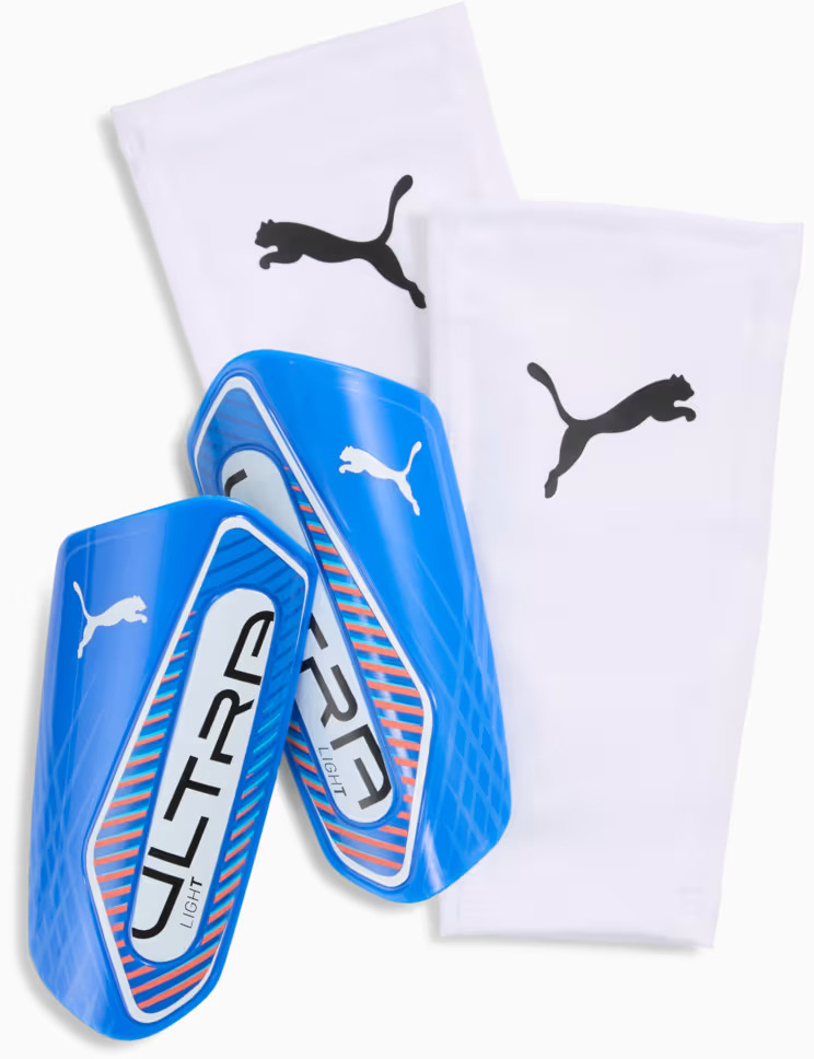 Щитки Puma ULTRA Light Sleeve голубой M (рост 135-155 см) (030989-04) Щитки Puma ULTRA Light Sleeve голубой M (рост 135-155 см) (030989-04)