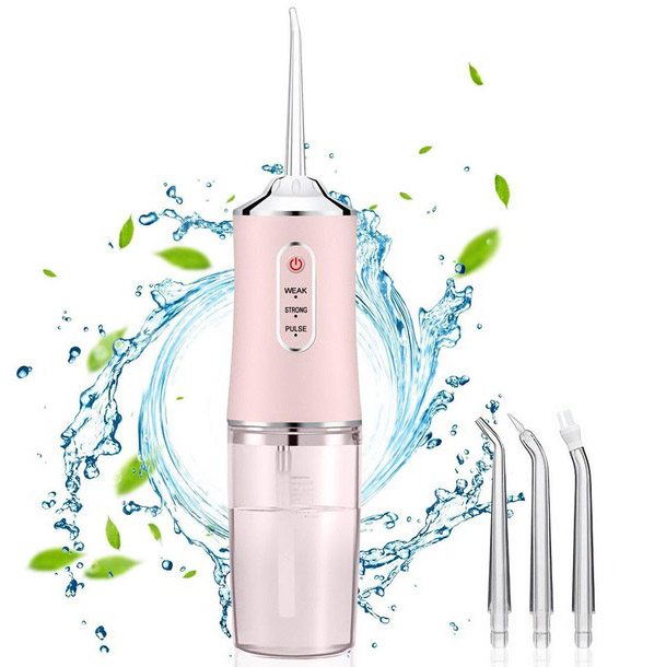 Ирригатор для чистки зубов и полости рта Oral Irrigator с аккумулятором и сменными насадками Pink Ирригатор для чистки зубов и полости рта Oral Irrigator с аккумулятором и сменными насадками Pink