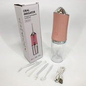 Ирригатор для чистки зубов и полости рта Oral Irrigator с аккумулятором и сменными насадками Pink. Изображение №2 Ирригатор для чистки зубов и полости рта Oral Irrigator с аккумулятором и сменными насадками Pink. Изображение №2