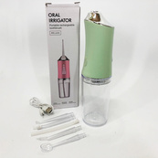 Ирригатор для чистки зубов и полости рта Oral Irrigator с аккумулятором и сменными насадками Green. Изображение №6 Ирригатор для чистки зубов и полости рта Oral Irrigator с аккумулятором и сменными насадками Green. Изображение №6