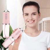 Ирригатор для чистки зубов и полости рта Oral Irrigator с аккумулятором и сменными насадками Pink. Изображение №5 Ирригатор для чистки зубов и полости рта Oral Irrigator с аккумулятором и сменными насадками Pink. Изображение №5