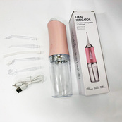 Ирригатор для чистки зубов и полости рта Oral Irrigator с аккумулятором и сменными насадками Pink. Изображение №6 Ирригатор для чистки зубов и полости рта Oral Irrigator с аккумулятором и сменными насадками Pink. Изображение №6