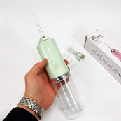 Ирригатор для чистки зубов и полости рта Oral Irrigator с аккумулятором и сменными насадками Green. Изображение №12 Ирригатор для чистки зубов и полости рта Oral Irrigator с аккумулятором и сменными насадками Green. Изображение №12