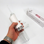 Ирригатор для чистки зубов и полости рта Oral Irrigator с аккумулятором и сменными насадками White. Изображение №19 Ирригатор для чистки зубов и полости рта Oral Irrigator с аккумулятором и сменными насадками White. Изображение №19
