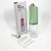 Ирригатор для чистки зубов и полости рта Oral Irrigator с аккумулятором и сменными насадками Green. Изображение №17 Ирригатор для чистки зубов и полости рта Oral Irrigator с аккумулятором и сменными насадками Green. Изображение №17